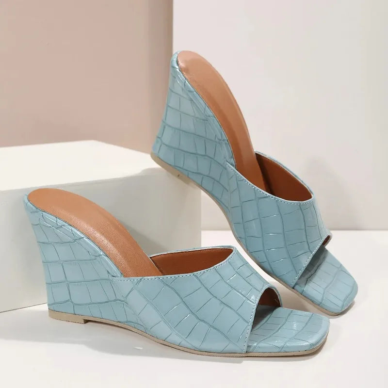 Croselle Embossed Heel Slides