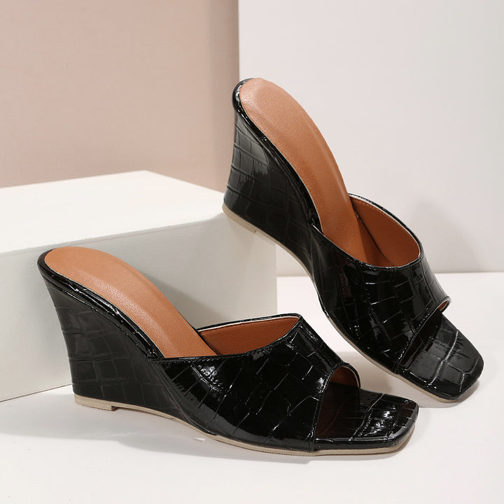 Croselle Embossed Heel Slides
