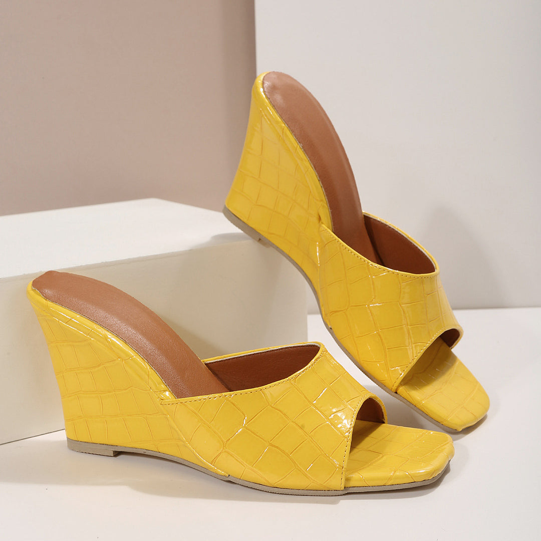 Croselle Embossed Heel Slides