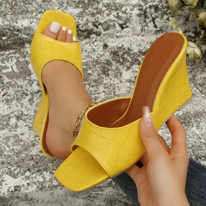 Croselle Embossed Heel Slides